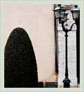 Italian lamp and resting place in Sarteano square